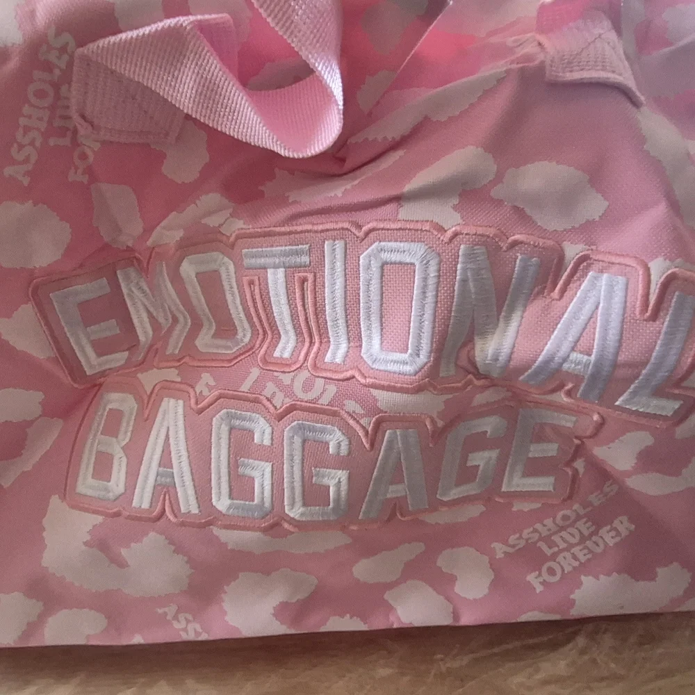 Pink Printed Garment Bag with Bold Slogan